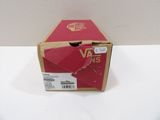a red box that has a pair of shoes in it
