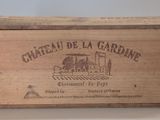 a wooden box with a label on it that says chateau de la gardine