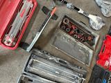 a lot of tools that are sitting on the floor
