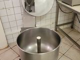 an image of a kitchen with a large bowl on a stand