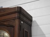 a clock that is on the wall of a building