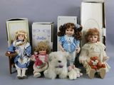 a group of dolls sitting next to each other on a table