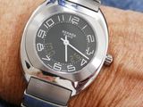 a close up of a person ' s wrist with a watch on it