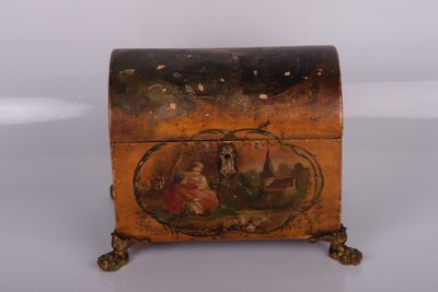 an old wooden box with a painting on it sitting on a table