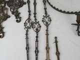 a lot of antique metal items on the table