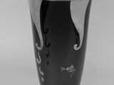 a black vase with a silver base on a white background