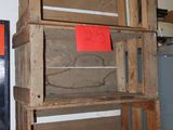 a stack of wooden crates sitting on top of a counter