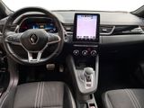 the interior of a car with a steering wheel, dashboard, and a touch screen