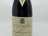 a bottle of wine that is sitting on a table
