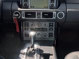 a car dashboard with a control panel and a steering wheel