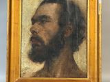 portrait of a bearded man with a beard in a gold frame