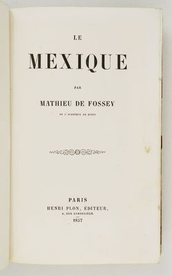 un livre ouvert sur une surface blanche avec un titre en noir et blanc
