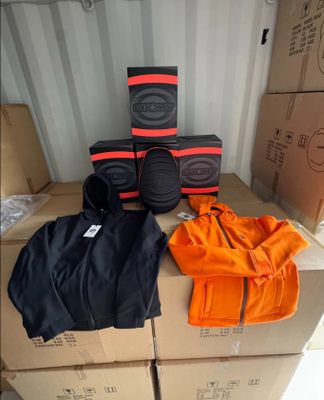 a box with a pair of knee pads on top of it