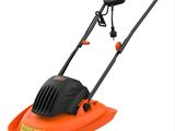 une tondeuse à gazon avec un manche orange sur fond blanc