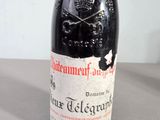 a bottle of wine that is sitting on a table