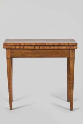 an image of a small table with a wooden top and legs