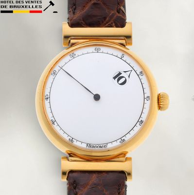 an image of a close up of a wrist watch with a white dial
