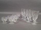 a group of wine glasses that are sitting on a table