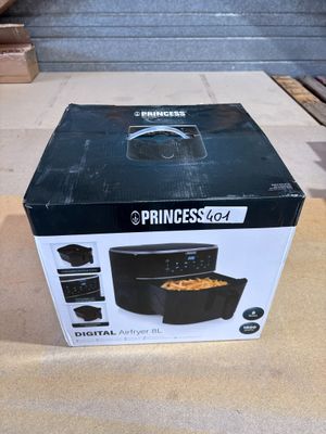 a box of food sitting on a counter top next to a microwave