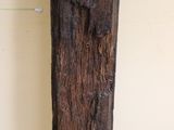 a piece of wood that is sitting on the floor