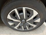 a close up of a tire on a car ' s rim