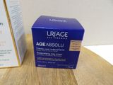 a box of cream sitting on a table next to a box of cream