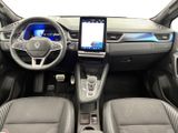a picture of the interior of a car with a touch screen