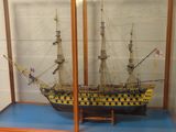 a model of a ship in a glass case