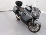 a motorcycle that is parked on the floor in a room