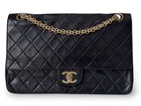 a chanel black quilted leather shoulder bag with gold hardware