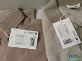 a picture of a pair of pants with a price tag on them