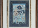 framed picture of a picture of a man and a woman in a boat
