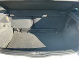 a trunk of a car with its trunk open