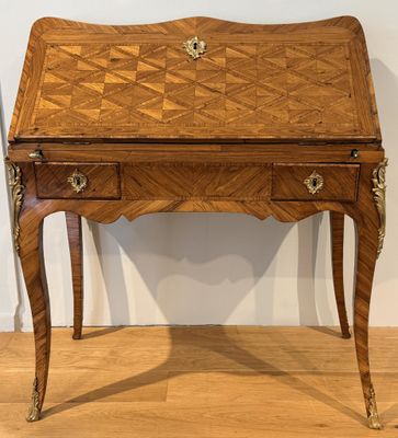 an image of a desk with a drawer on top of it on a hard wood floor
