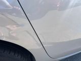 a close up of a car ' s side door with a sticker on it