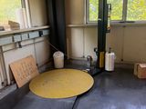 a yellow mat on the floor in a room