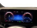 the dashboard of a car with a digital display on it