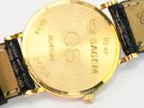 an image of a close up of a wrist watch on a white surface
