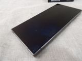 a cell phone that is laying on a table