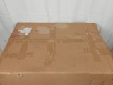 a cardboard box that is sitting on a white surface