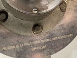 a close up of a metal object on a table
