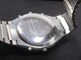 a close up of a wrist watch on a table