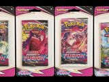 three packs of pokemon trading cards are shown in a row