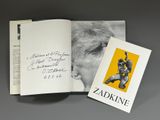an open book with a picture of a man on it