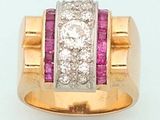 an image of a diamond and ruby ring on a white background