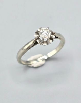 Bague "solitaire" en or blanc 750°° ornée d'un diamant taill…