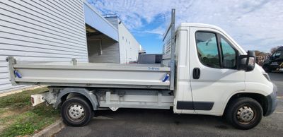 a white truck that is parked in the parking lot