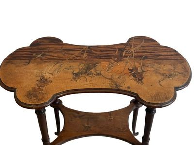 an image of a wooden table with a painted design on it