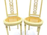 pair of antique cane back chairs with wicker seats
