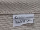 a close up of a label on the back of a chair